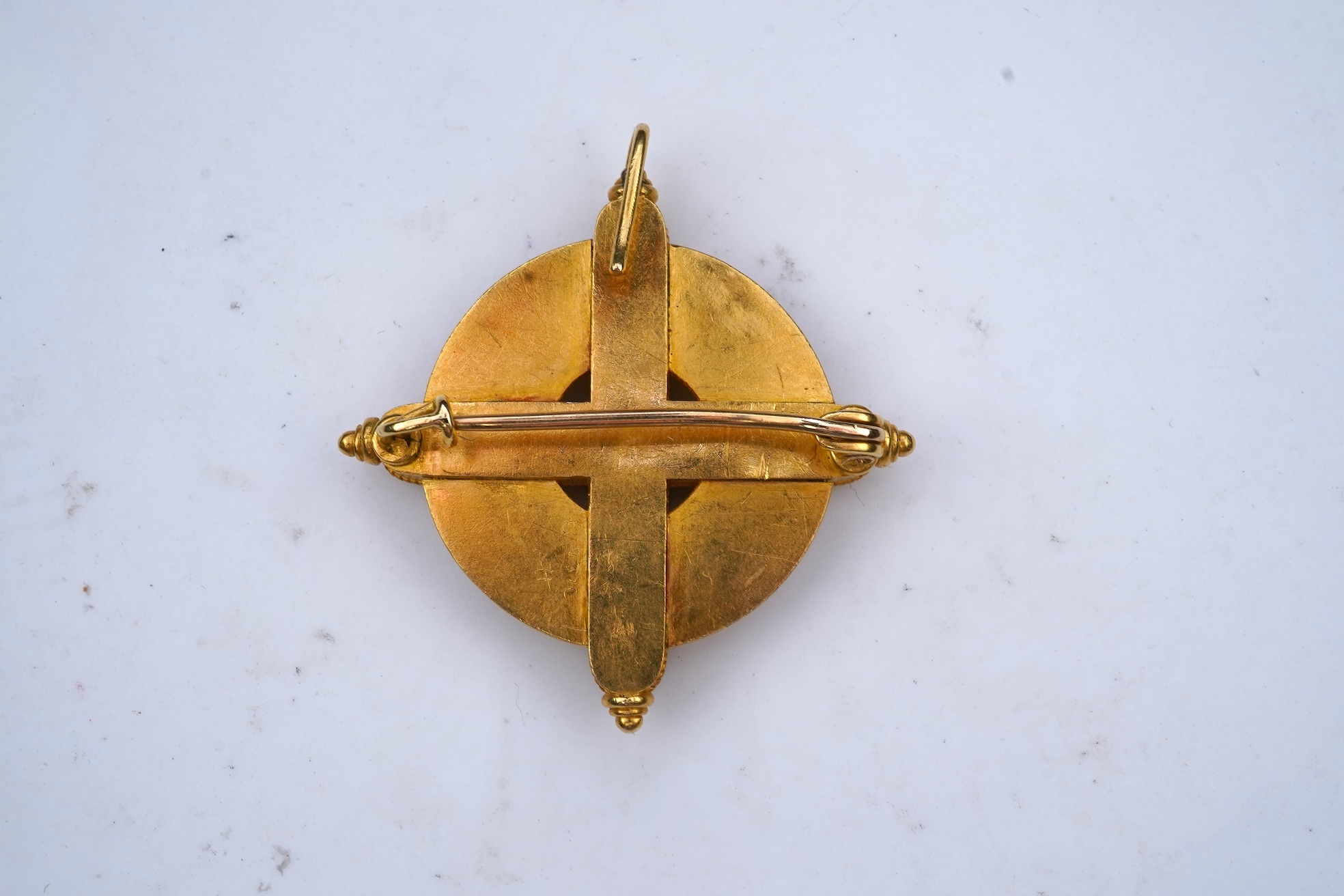 A gold, enamel and pearl pendant/brooch, mid 19th century, and a pair of earrings